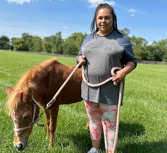 Khadija and Honey bonding at Coping Together Ranch